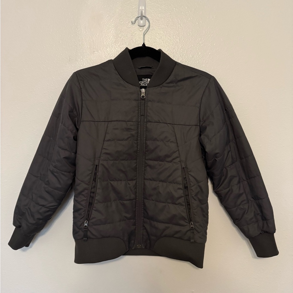 The North Face Black Puffer Jacket with Quilted Design and Ribbed Cuffs